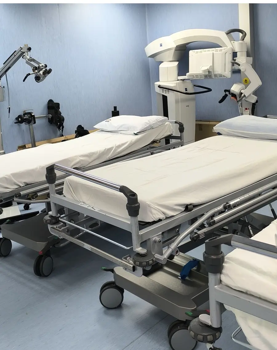 Theatre receiving bay with patient beds at Loaro Surgical Clinic